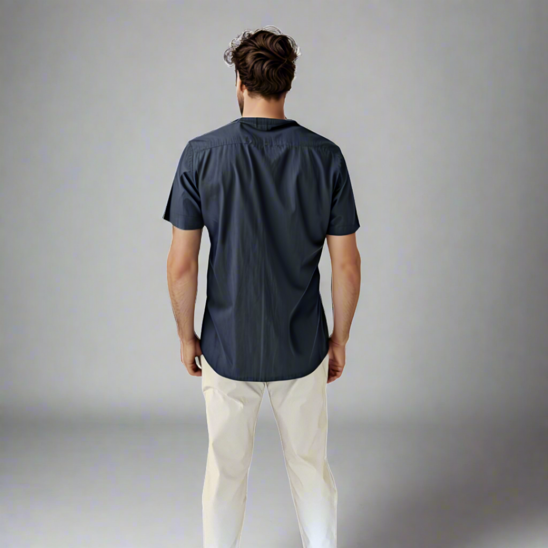 Jorge rear shot wearing sand GTO pants and casual shirt