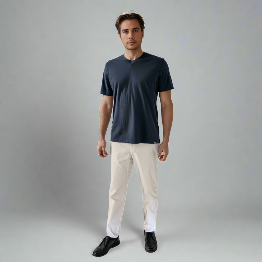 Jorge wearing sand colored GTO pants with casual tshirt